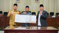 Wakil Bupati Batu Bara Sampaikan Komitmen Penguatan Tata Kelola Keuangan Daerah dan Transformasi BUMD di Rapat Paripurna DPRD Wakil Bupati Batu Bara Sampaikan Komitmen Penguatan Tata Kelola Keuangan Daerah dan Transformasi BUMD di Rapat Paripurna DPRD